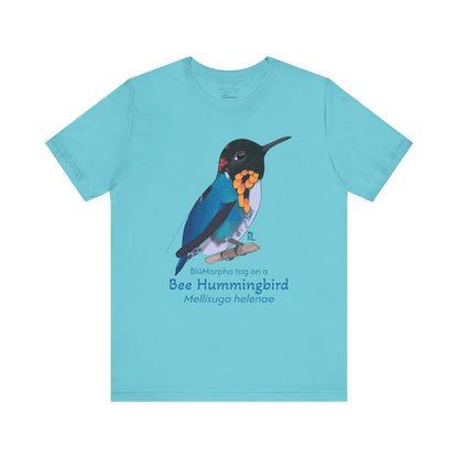 Turquoise t-shirt with a colorful bee hummingbird illustration and text on a white background