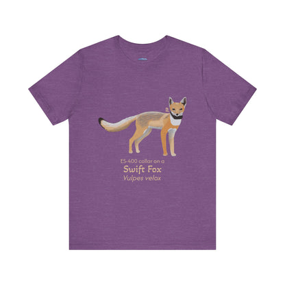 Purple t-shirt with a swift fox illustration and text on a white background