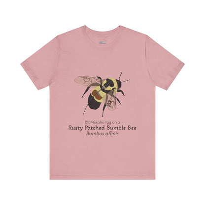light Pink t-shirt with a rusty patched bumble bee illustration and text on a white background