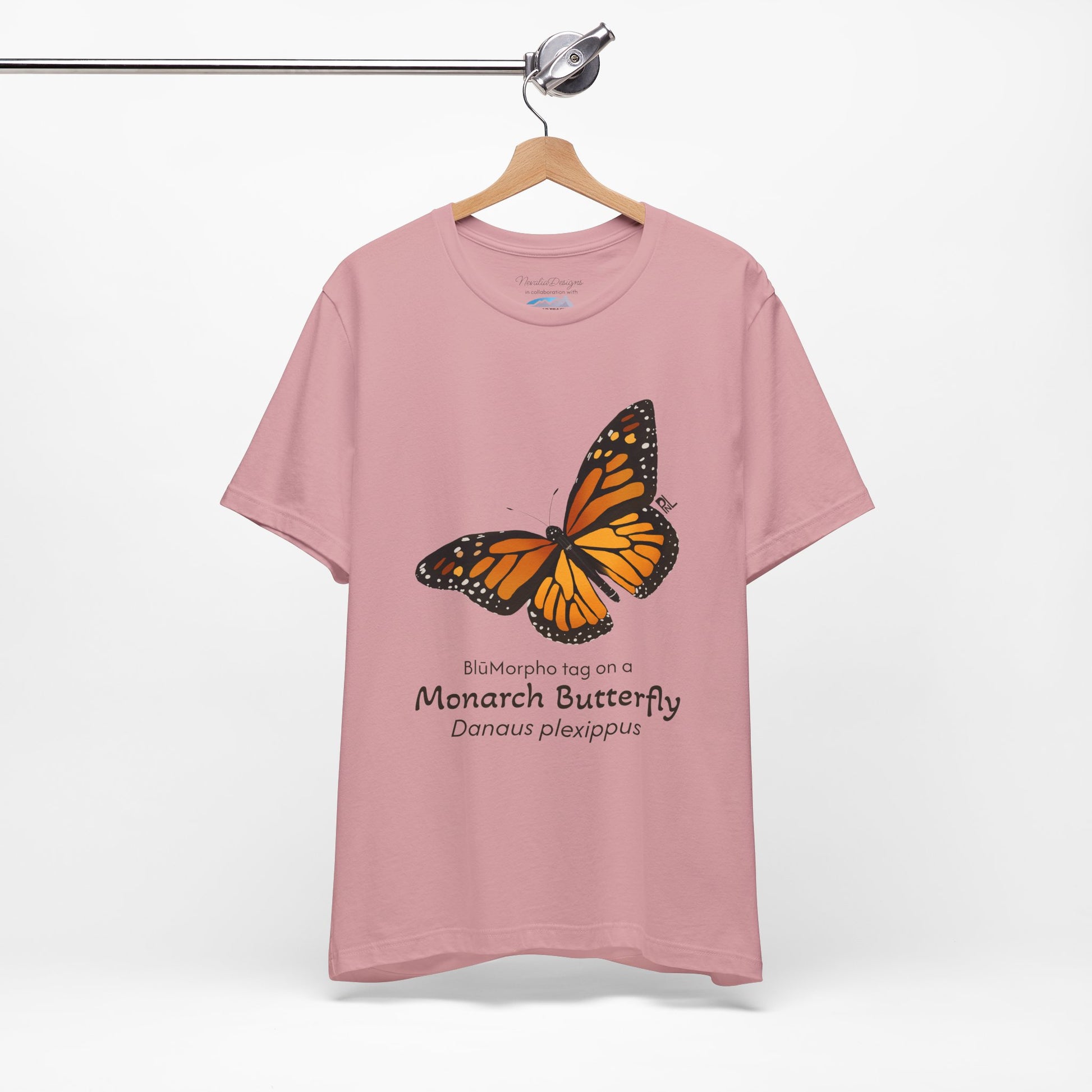 light Pink t-shirt with a monarch butterfly illustration and text on a white background