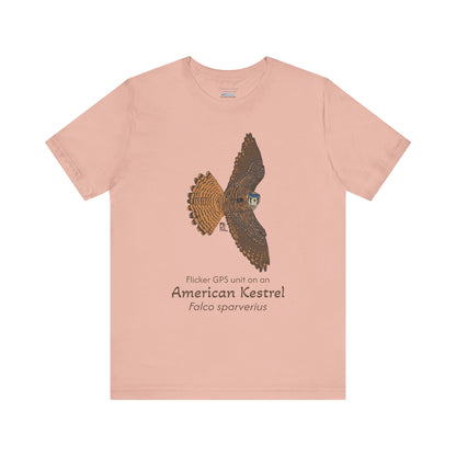 light orange t-shirt with an American Kestrel illustration and text on a white background
