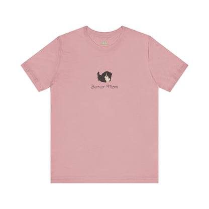 Light pink t-shirt with a kawaii dog illustration and 'Berner Mom' text on a white background