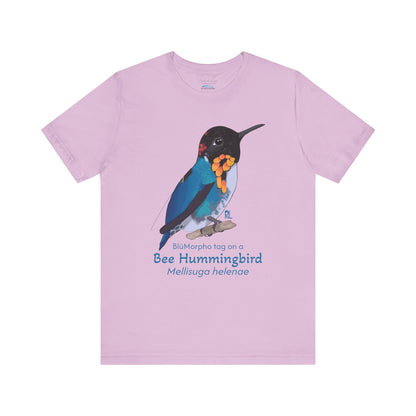 light purple t-shirt with a colorful bee hummingbird illustration and text on a white background