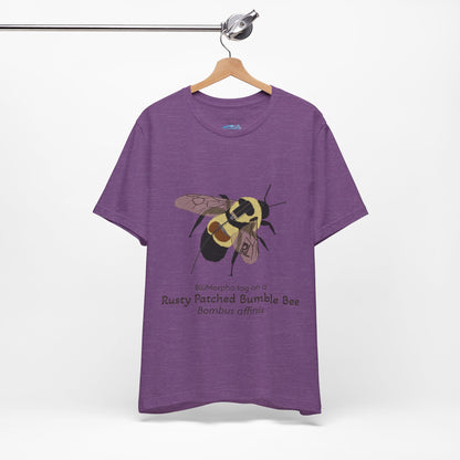 Purple t-shirt with a rusty patched bumble bee illustration and text on a hanger against a white background