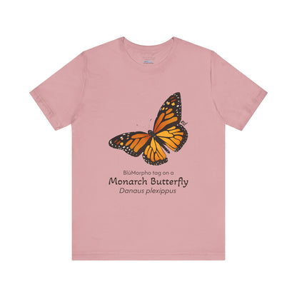 light Pink t-shirt with a monarch butterfly illustration and text on a white background