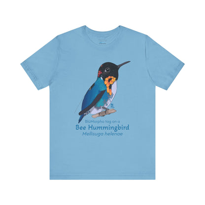 Light blue t-shirt with a colorful bee hummingbird illustration and text on a white background