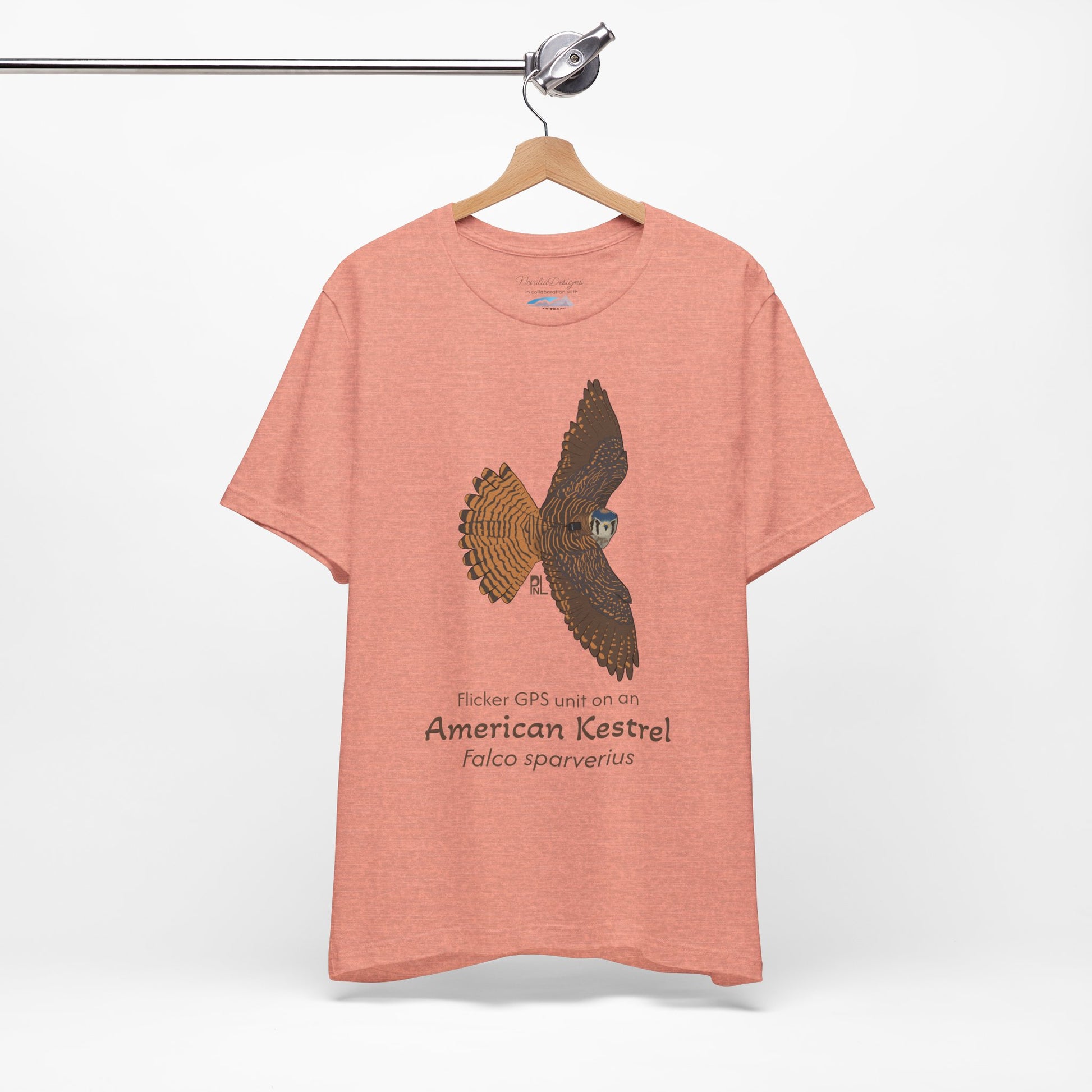 light orange t-shirt with an American Kestrel illustration and text on a white background